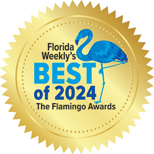 A gold seal with a blue flamingo and text: Florida Weekly’s Best of 2024, The Flamingo Awards.