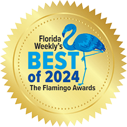 A gold seal with a blue flamingo and text that reads, Florida Weekly’s BEST of 2024 The Flamingo Awards.